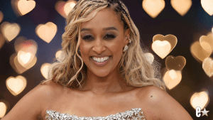 Tia Mowry smiles on the red carpet
