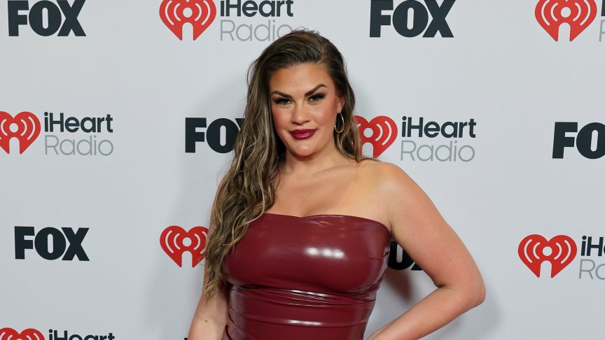 Brittany Cartwright poses on the red carpet at the 2025 iHeartRadio Music Awards in Hollywood.