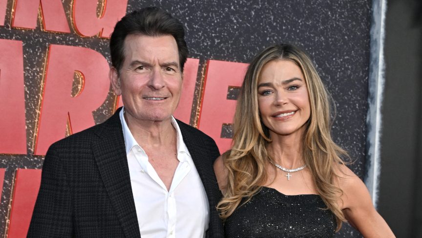 Charlie Sheen and Denise Richards pose together at the Los Angeles premiere of Netflix's aka Charlie Sheen in September 2025.