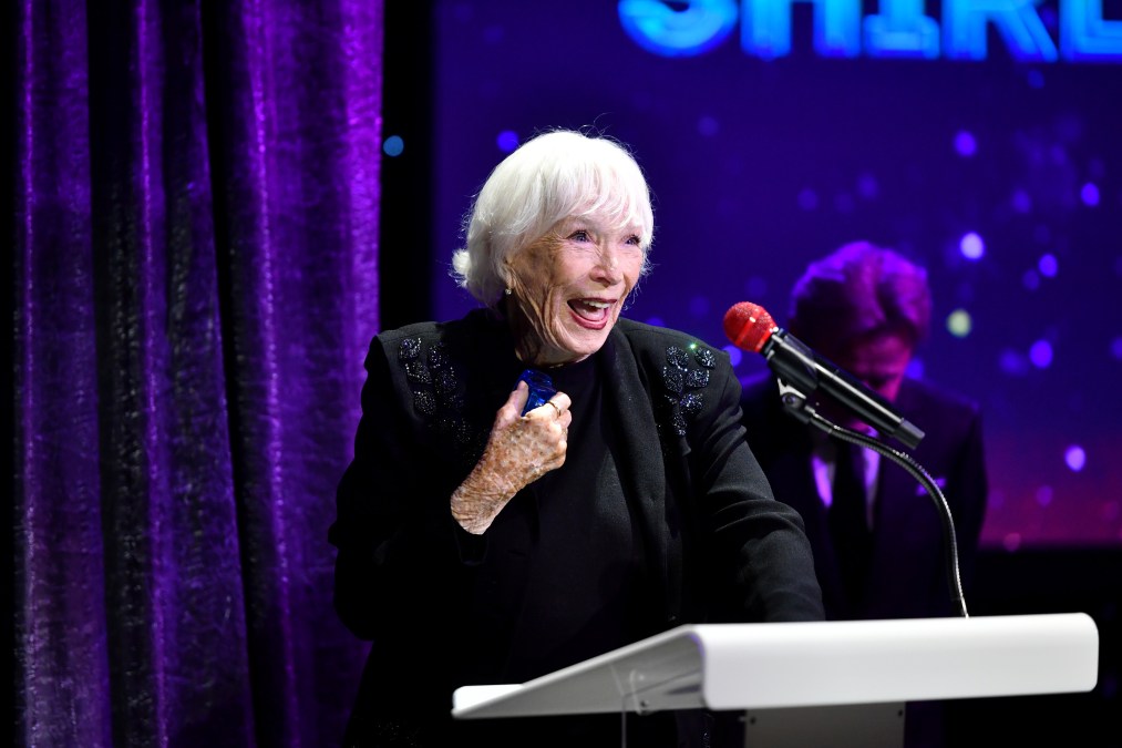 Shirley MacLaine accepts the Lifetime Achievement Award onstage in 2025
