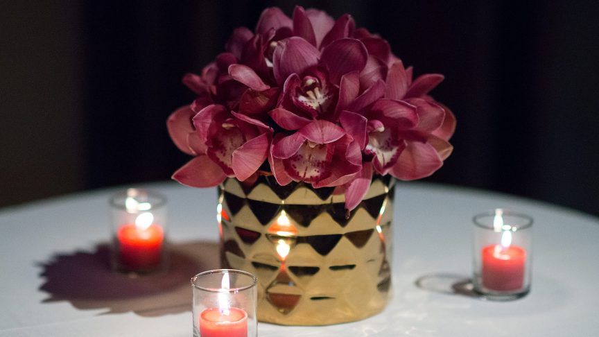 Flowers and candles for Mark Rydell.