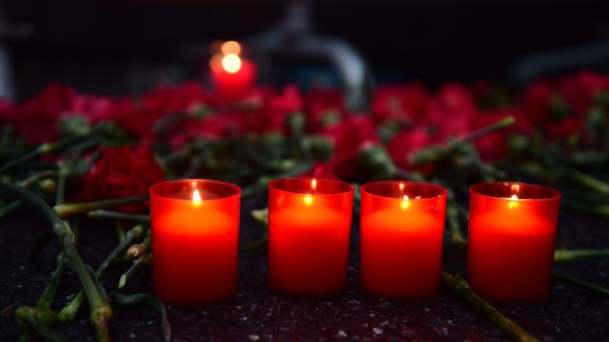 Candles and flowers for Nick Joseph.