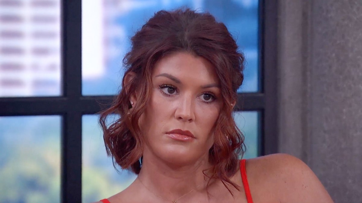 Haley Thogmartin sits in the Big Brother 28 living room with a serious look on her face.