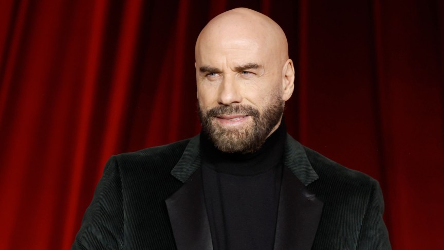 John Travolta attends an event