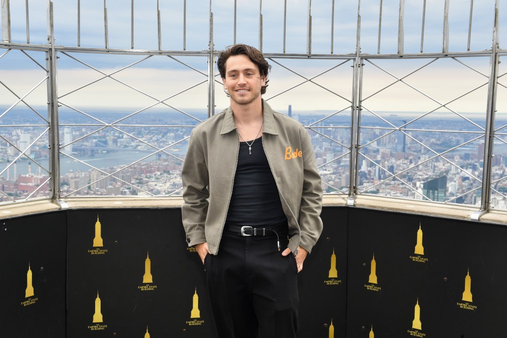 A photo showing Liam Obergfoll sporting a green jacket and black pants at an event.