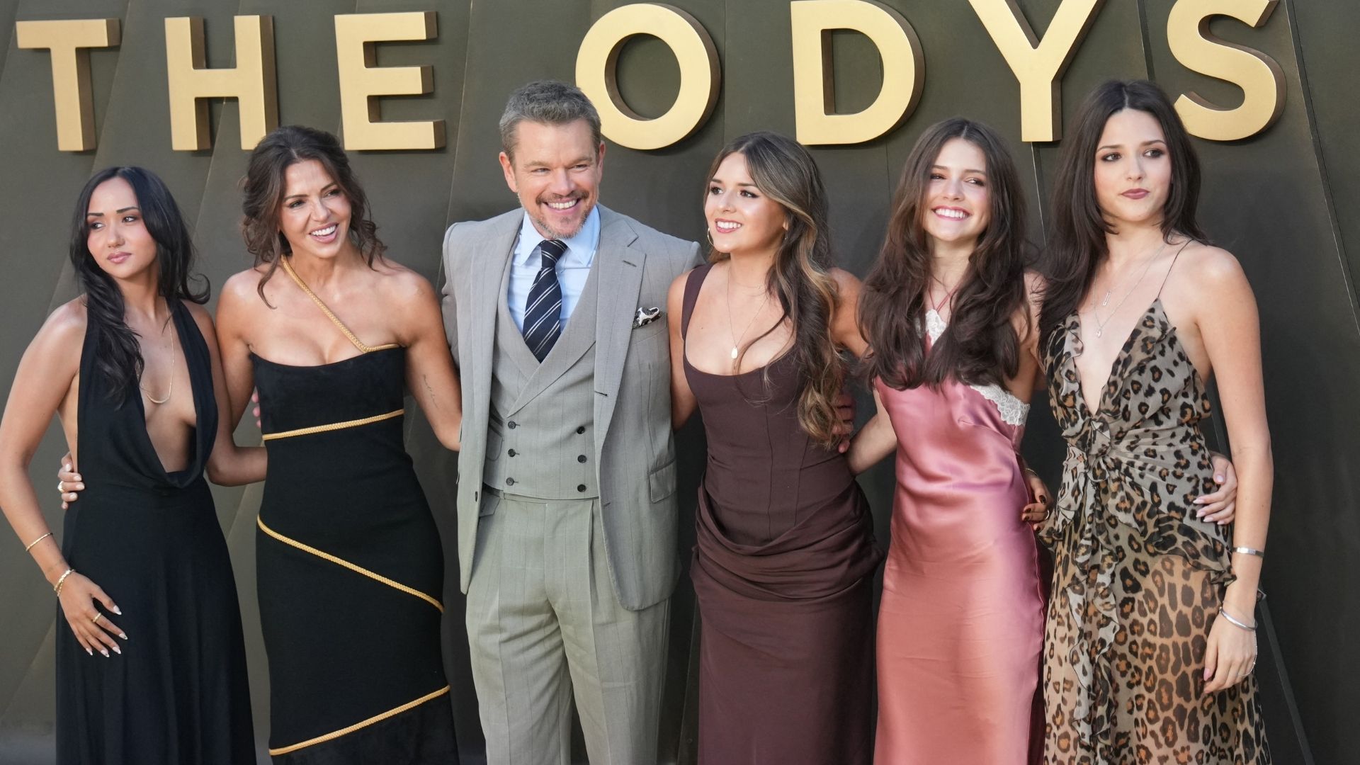 US actor Matt Damon and his wife, film producer Luciana Barroso (2L) pose with their daughters on the red carpet as they arrive to attend the world premiere of the film 'The Odyssey' in London on July 6, 2026.