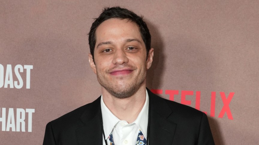 Pete Davidson poses for photos at an event