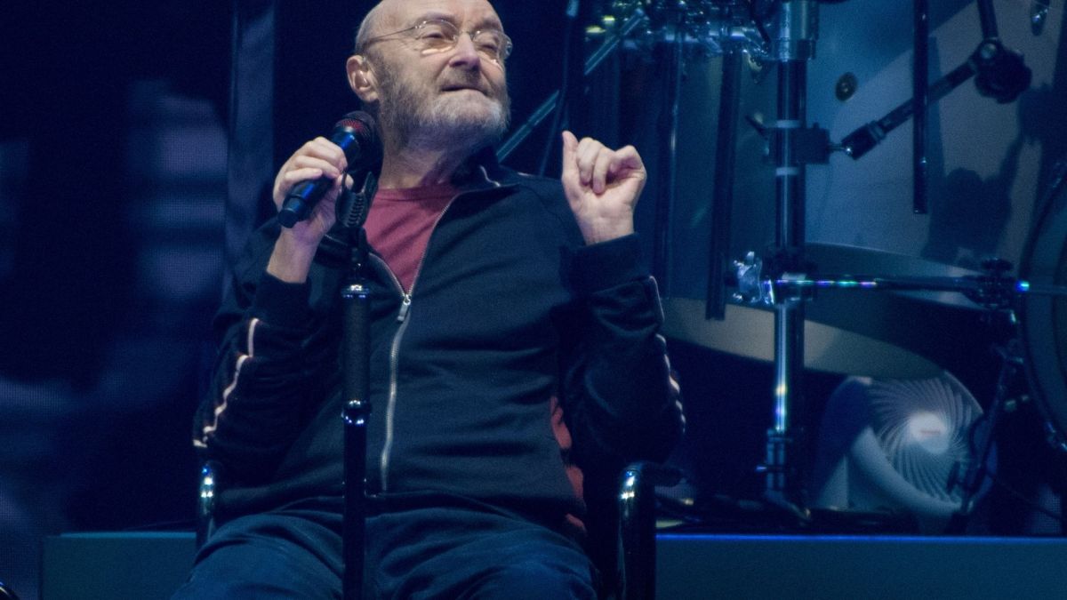 hil Collins of Genesis performs on the opening night of their North American "The Last Domino?" tour at the United Center on November 15, 2021 in Chicago, Illinois.