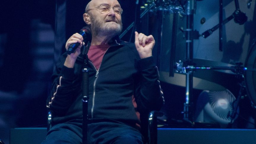 hil Collins of Genesis performs on the opening night of their North American "The Last Domino?" tour at the United Center on November 15, 2021 in Chicago, Illinois.