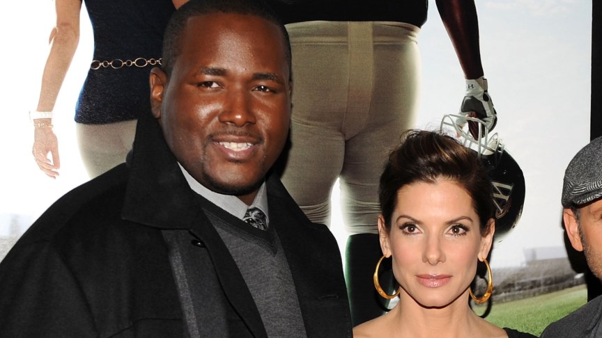 Quinton Aaron and Sandra Bullock attend an event