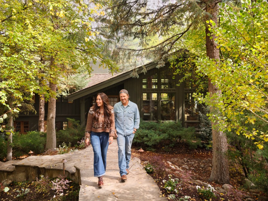 Hosts, Chip and Joanna Gaines portrait in the finished house, as seen on Fixer Upper: Colorado Mountain House
