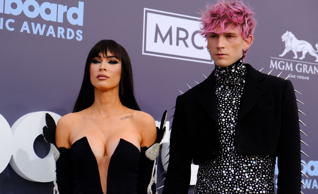 Meghan Fox and MGK posing for US-ENTERTAINMENT-MUSIC-AWARD-BILLBOARD 