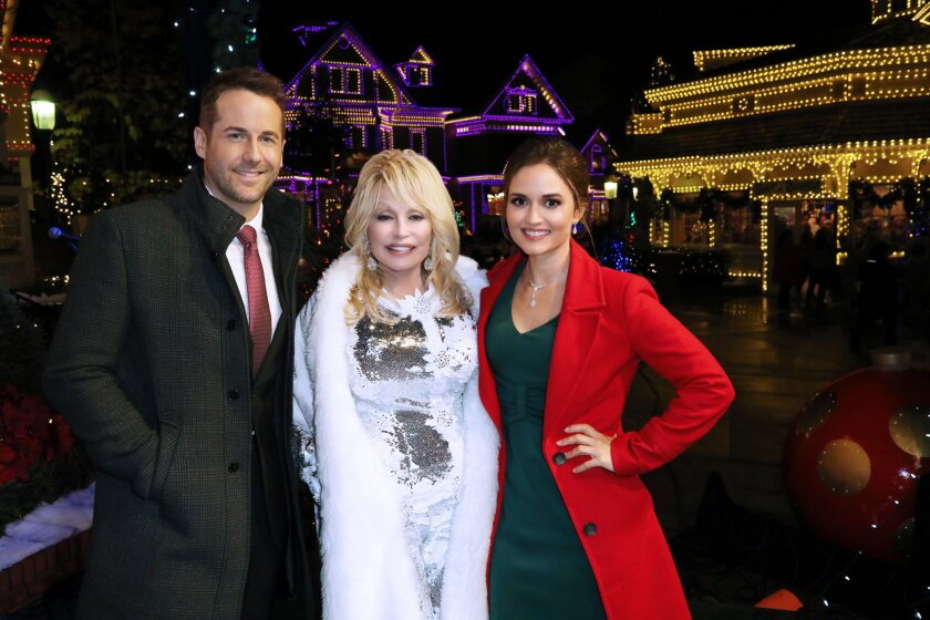 Danica McKellar, Niall Matter and Dolly Parton in "Christmas at Dollywood" from Hallmark
