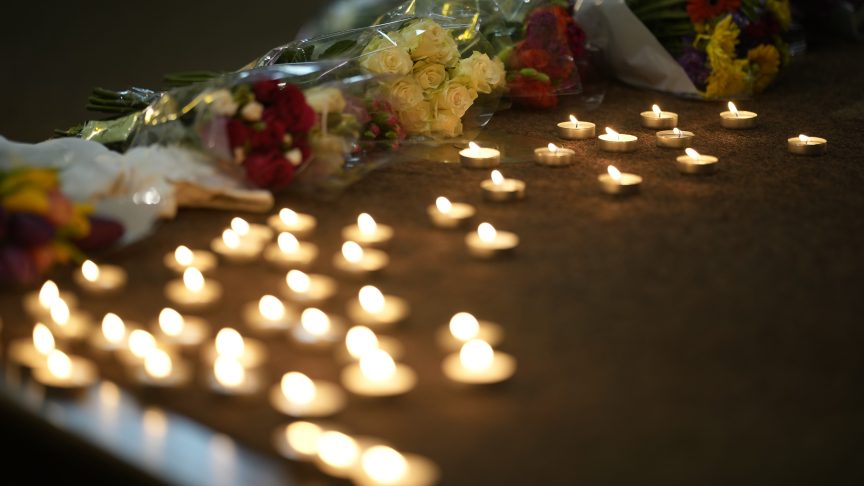 Flowers and candles for Sway DaSafo.