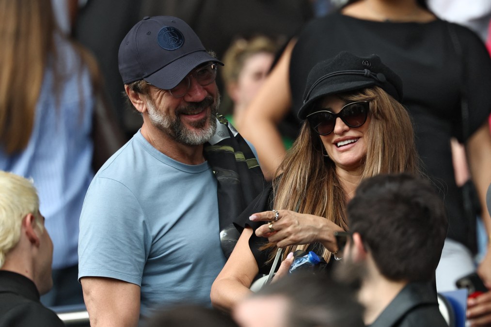 Javier Bardem and Penelope Cruz attend a football match
