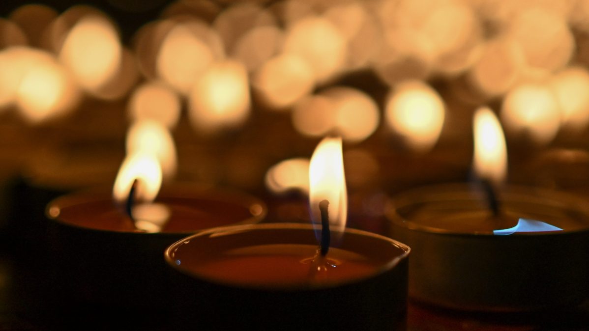 Candles for Neil Henderson.