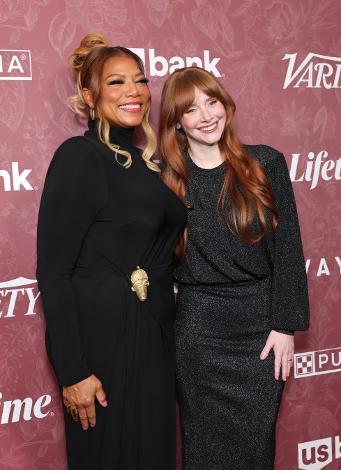 Queen Latifah and Bryce Dallas Howard smiling at an event