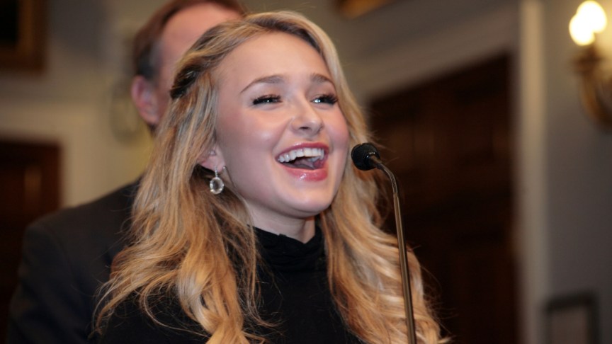 Hayden Panettiere speaking onstage