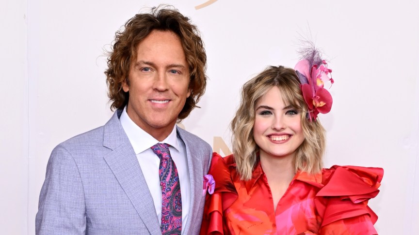 Larry Birkhead and Dannielynn Birkhead pose for photos