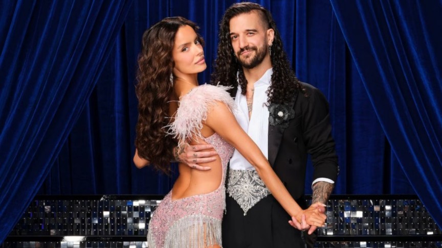 Maura Higgins holds hands with Mark Ballas in dance attire.