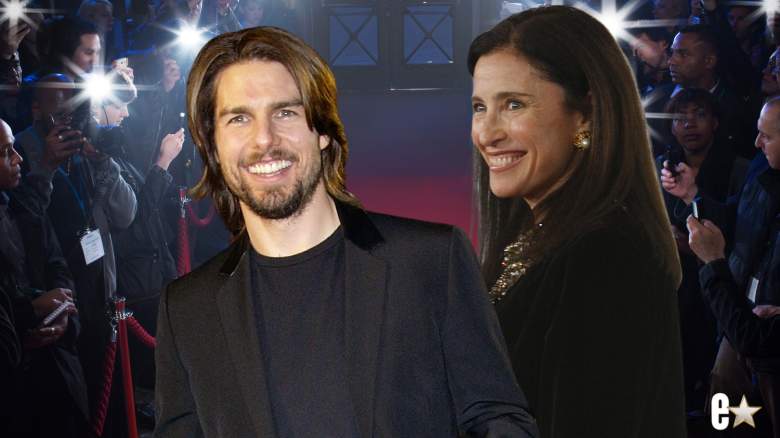 Tom Cruise and Mimi Rogers smiling at an event