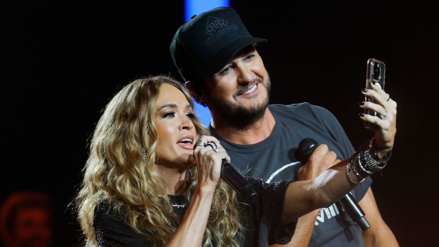 Luke Bryan brings fellow "American idol" judge out on stage to sing Bon Jovi