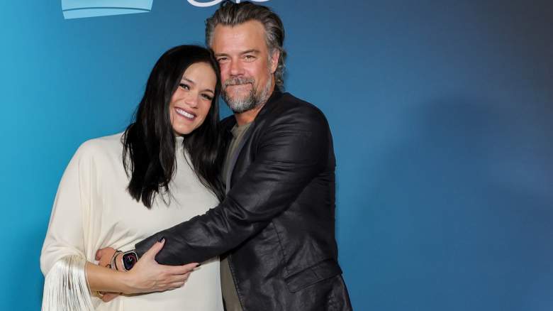 Josh Duhamel wraps his arms around Audra Mari.
