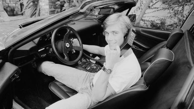Christopher Atkins sitting inside a car