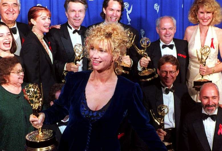 Actress Kathy Baker walks in front of the cast of the Emmy-winning show "Picket Fences" aftere Tom Skerritt won for Best Actor and she won the Best Actress Award in 1993.