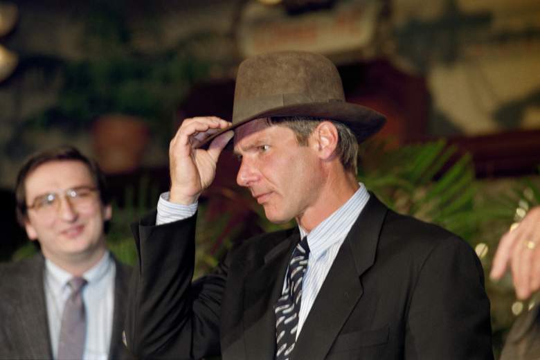 Harrison Ford trying on Indiana Jones hat in 1989