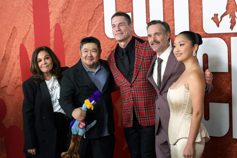 Eric Bauza (holding Road Runner) with the cast of "Coyote Vs. Acme" at its premiere.