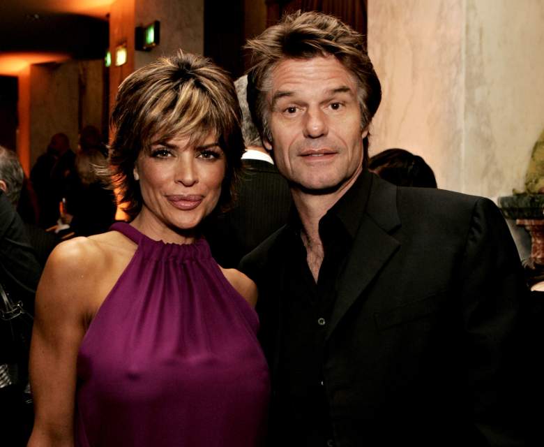 Lisa Rinna and actor Harry Hamlin speak during the EIF's Women's Cancer Research Fund honoring Melissa Etheridge at Saks Fifth Avenue's Unforgettable Evening on March 1, 2006 at the Regent Beverly Wilshire Hotel in Beverly Hills, California. (Photo by Kevin Winter/Getty Images)