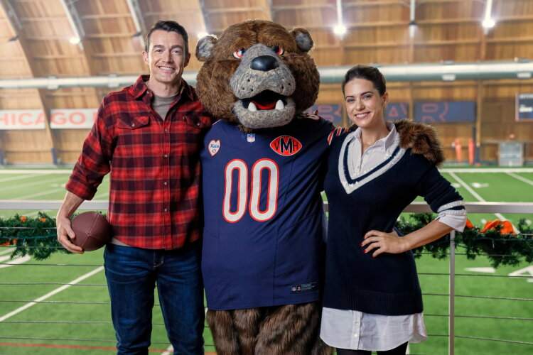 Robert Buckley and Lyndsy Fonseca from Hallmark's 'Holiday Touchdown: A Bears Love Story'